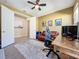 Spacious home office with built-in desk and room for a comfortable seating area at 15305 Isla Palma Ln, Nokomis, FL 34275