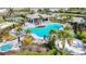 Resort-style pool with spa and covered seating area at 15305 Isla Palma Ln, Nokomis, FL 34275