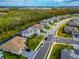 Aerial view of a quiet residential street with upscale homes and manicured lawns at 16219 Tradewind Ter, Bradenton, FL 34211