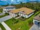 One-story house with a three-car garage and spacious lawn at 16219 Tradewind Ter, Bradenton, FL 34211