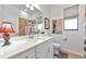 Clean bathroom with a white vanity and subway tile at 16219 Tradewind Ter, Bradenton, FL 34211