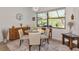 Light and airy dining area with glass-top table at 16219 Tradewind Ter, Bradenton, FL 34211