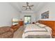 Spacious main bedroom with king bed and backyard view at 16219 Tradewind Ter, Bradenton, FL 34211