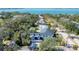 Aerial view of house and neighborhood, showcasing waterfront at 1686 North Dr, Sarasota, FL 34239