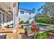 Stunning pool and patio, surrounded by lush landscaping at 1686 North Dr, Sarasota, FL 34239