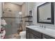 Clean bathroom with a walk-in shower and modern vanity at 17649 Northwood Pl, Bradenton, FL 34202