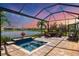 Relaxing pool and lanai area with seating at 17649 Northwood Pl, Bradenton, FL 34202