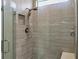 Large walk-in shower with glass enclosure and built-in seat at 17649 Northwood Pl, Bradenton, FL 34202