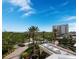 Aerial view showing the building's position near the ocean and surrounding neighborhood at 1800 Benjamin Franklin Dr # B408, Sarasota, FL 34236