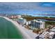 Stunning aerial view of beachfront property and coastline at 1800 Benjamin Franklin Dr # B408, Sarasota, FL 34236