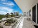 Outdoor balcony with city and water views at 1800 Benjamin Franklin Dr # B408, Sarasota, FL 34236