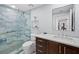 Bathroom with marble shower and vanity at 1800 Benjamin Franklin Dr # B408, Sarasota, FL 34236