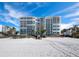 Beachfront building with balconies and ocean views at 1800 Benjamin Franklin Dr # B408, Sarasota, FL 34236