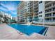 Large rectangular swimming pool in a condo complex at 1800 Benjamin Franklin Dr # B408, Sarasota, FL 34236