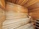 Relaxing sauna with wooden walls and a bench for comfortable seating at 1800 Benjamin Franklin Dr # B408, Sarasota, FL 34236