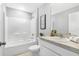 Clean bathroom with a shower/tub combo and white vanity at 21192 Winside Ave, Port Charlotte, FL 33952