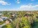 Neighborhood view with lush greenery at 21264 Wynyard Ave, Port Charlotte, FL 33954