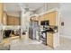 Kitchen with stainless steel appliances and wood cabinets at 21264 Wynyard Ave, Port Charlotte, FL 33954