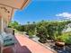 Relaxing patio area with seating and lush greenery at 2153 Pueblo Cir # V14, Sarasota, FL 34231