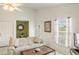 Living room with beige couch and tiled coffee table at 2711 Larkspur Dr, Punta Gorda, FL 33950