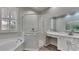 Bathroom boasts a large vanity, walk-in shower, and soaking tub at 2914 112Th E Ter, Parrish, FL 34219