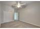 Spacious bedroom with ceiling fan, double door closet and carpet flooring at 2914 112Th E Ter, Parrish, FL 34219