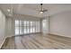 Living room with pool view, light floors, and plantation shutters at 2914 112Th E Ter, Parrish, FL 34219