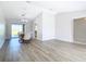 Spacious dining room with luxury vinyl plank flooring and a chandelier, perfect for gatherings and special occasions at 31 Bunker Pl, Rotonda West, FL 33947