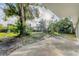 Large backyard with mature trees at 3107 34Th Avenue W Dr, Bradenton, FL 34205