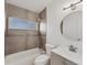 Updated bathroom with a bathtub, toilet and vanity at 3107 34Th Avenue W Dr, Bradenton, FL 34205