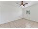 Bedroom with ceiling fan and window at 3107 34Th Avenue W Dr, Bradenton, FL 34205