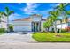 Single story house with tile roof and stone accents at 3218 Big Sky Way, Bradenton, FL 34211