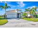 Single story house with tile roof and stone accents at 3218 Big Sky Way, Bradenton, FL 34211