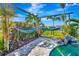 Tropical backyard oasis with pool and hammocks at 3218 Big Sky Way, Bradenton, FL 34211