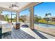 Relaxing screened patio with pool and lake views at 3218 Big Sky Way, Bradenton, FL 34211