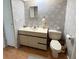 Bathroom with sink, toilet, and patterned tile at 3230 Banyan Ter, Sarasota, FL 34237