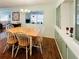 Bright dining room with built-in hutch and light wood table at 3230 Banyan Ter, Sarasota, FL 34237