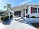 Covered carport and entrance to manufactured home at 3230 Banyan Ter, Sarasota, FL 34237