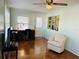 Living room with built-in shelving and seating area at 3230 Banyan Ter, Sarasota, FL 34237