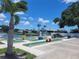 Community mini golf course with lighthouse and palm trees at 3230 Banyan Ter, Sarasota, FL 34237