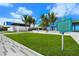 Siesta Public Beach access with modern building and historical marker at 3331 Old Oak Dr, Sarasota, FL 34239