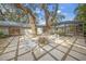 Charming courtyard with fire pit and stone tile at 3331 Old Oak Dr, Sarasota, FL 34239