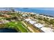 Aerial view showcasing a home's location in a waterfront golf community at 3491 Byron Ln, Longboat Key, FL 34228