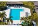 Community pool with ample lounge chairs and spa at 3491 Byron Ln, Longboat Key, FL 34228