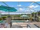 Enjoy scenic views from this relaxing poolside patio at 3491 Byron Ln, Longboat Key, FL 34228