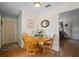 Small dining area with wooden table and chairs at 3503 18Th W Ave, Bradenton, FL 34205