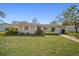 Single story home with a well-manicured lawn and driveway at 3503 18Th W Ave, Bradenton, FL 34205