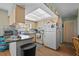 Kitchen with light wood cabinets and granite countertops at 3503 18Th W Ave, Bradenton, FL 34205