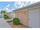 Exterior view showing building and landscaping at 4202 Caddie E Dr # 202, Bradenton, FL 34203