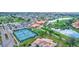 Community tennis courts near clubhouse and golf course at 4202 Caddie E Dr # 202, Bradenton, FL 34203